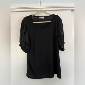 Black blouse with pleated semi sheer sleeves, 2x